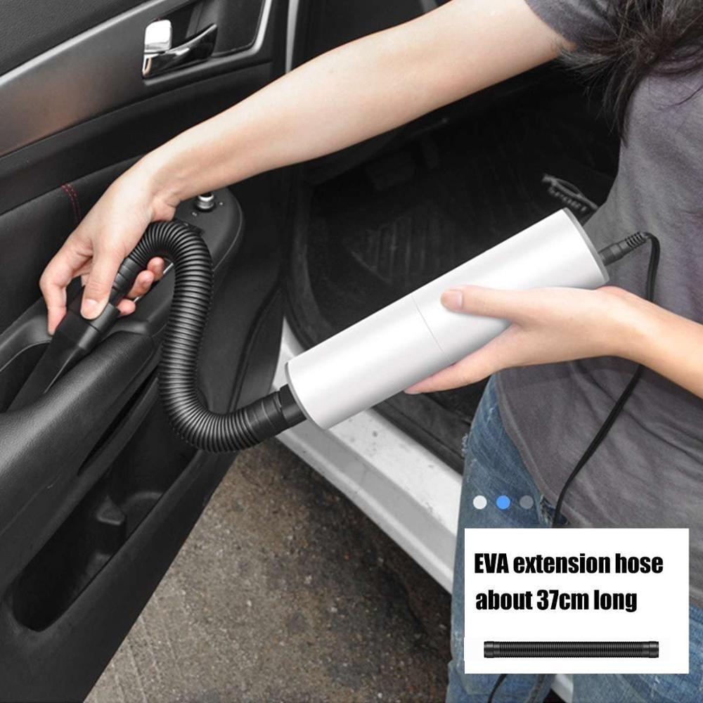 handheld vacuum cleaner being used in the car 