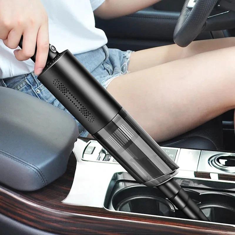 a girl using the portable vacuum cleaner in her car 