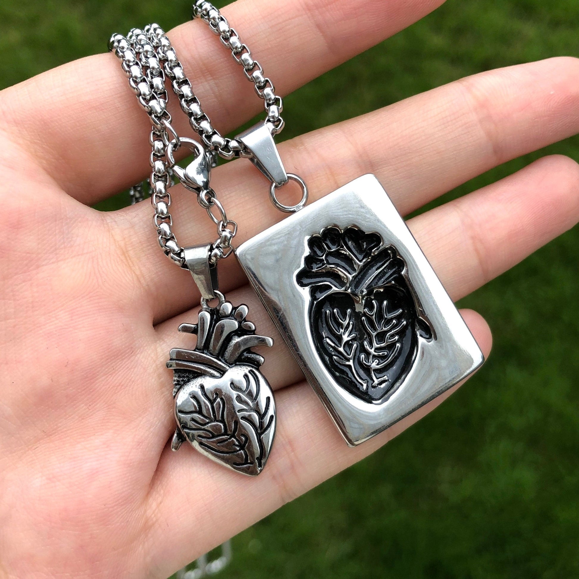 a girl holding the heart locket 