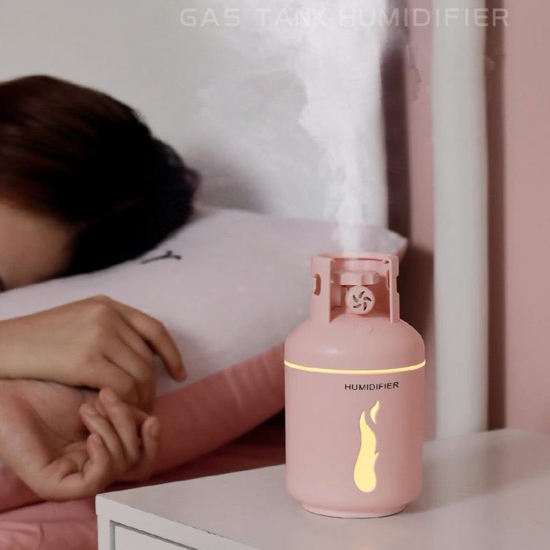 a girl sleeping near the baby humidifier 