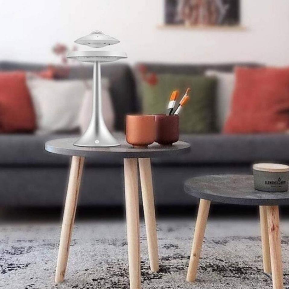 levitating speaker on table 