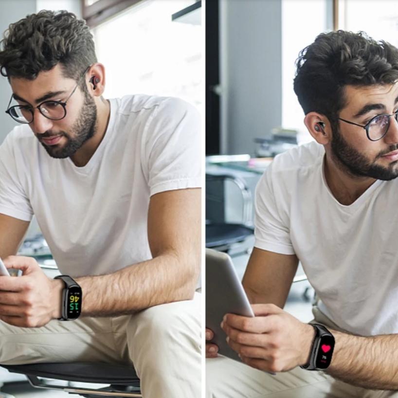 a man using the smartwatch at work 