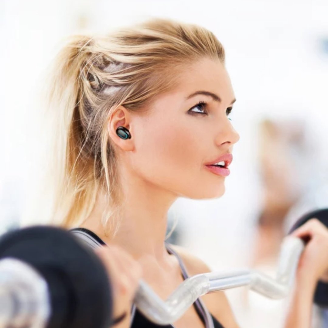 a girl wearing the bluetooth earbuds 